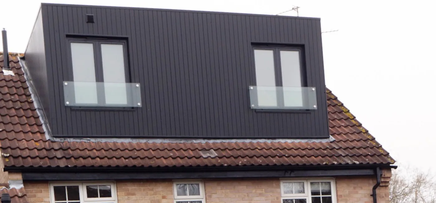 Contemporary clad dormer loft conversion by J.Berry